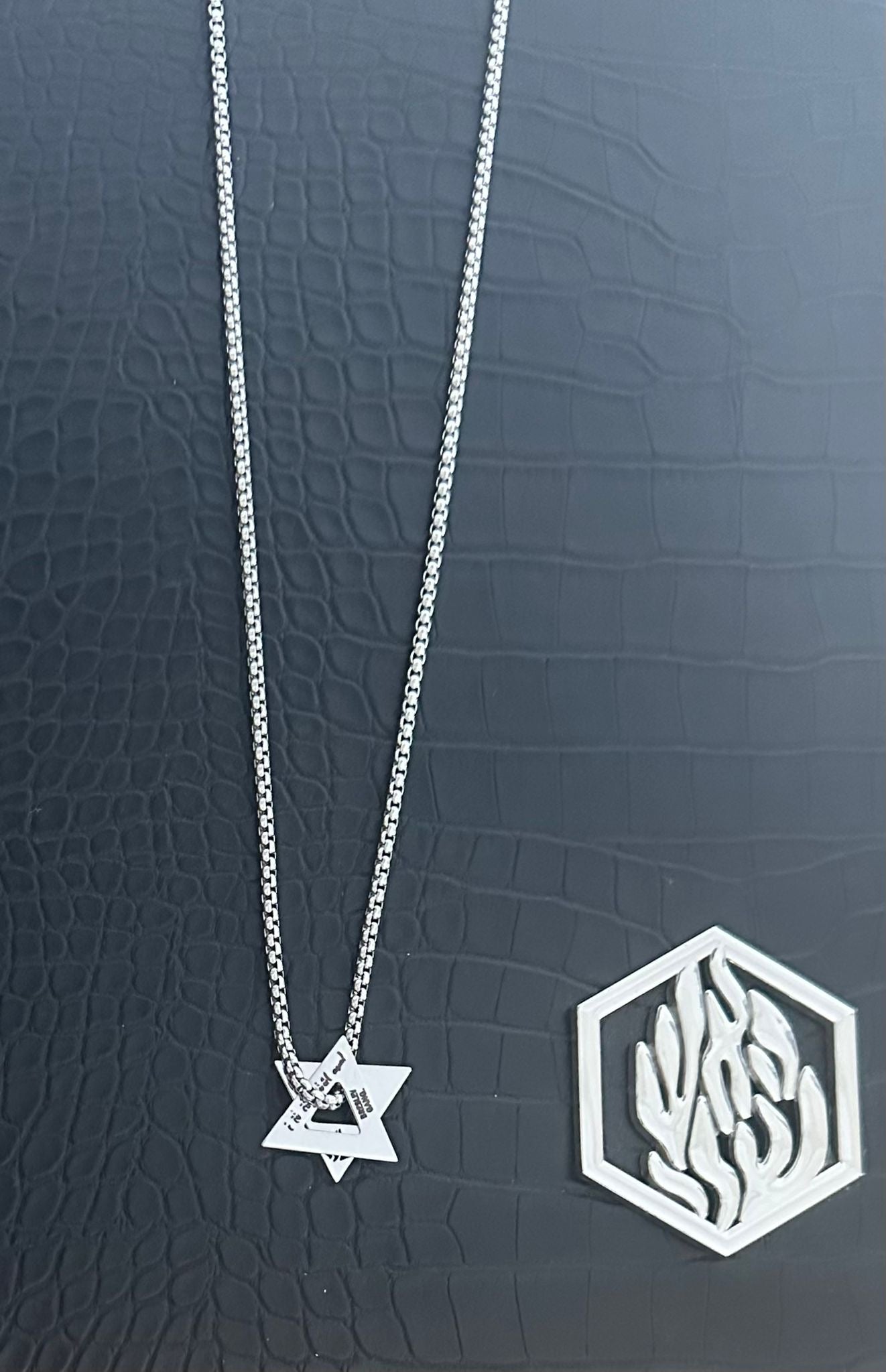 Double triangle Magen David, silver color.