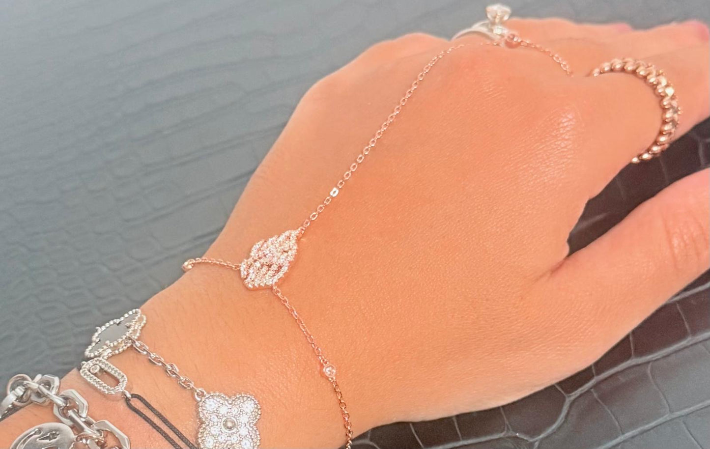 Rose gold flame hand bracelet