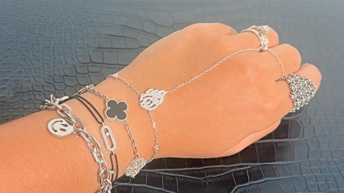 Silver flame hand bracelet